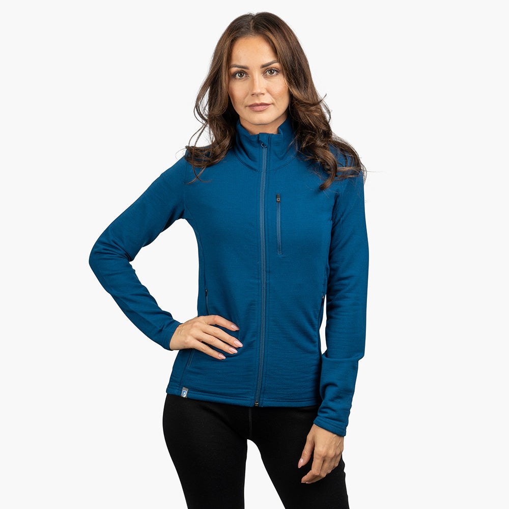 m² mit Reißverschlusstaschen, ideal für Outdoor-Aktivitäten, aus Merinowolle, Bambus-Viskose und Spandex für Komfort und Flexibilität.