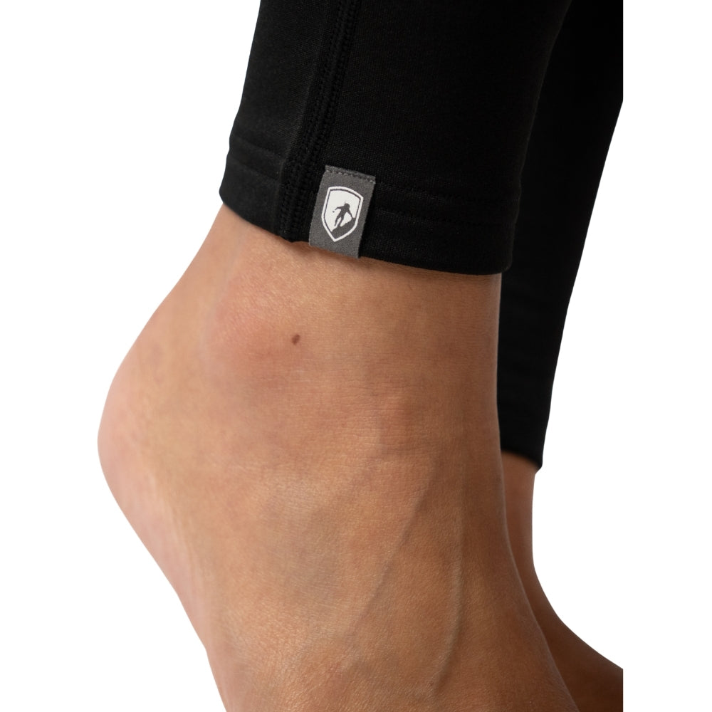 Merino Leggings/Hose Damen - 290 g/m2, formschlüssig, endet über dem Knöchel, mit Logo-Tag am Saum. Perfekt für Yoga, Reisen und Alltag, bietet Bewegungsfreiheit.