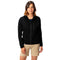 Frau trägt 100% Merino Sport Hoody mit Zip Damen - 230g/m2, locker geschnitten, mit Brusttasche und YKK-Reißverschluss, ideal für Outdoor-Aktivitäten und Reisen.